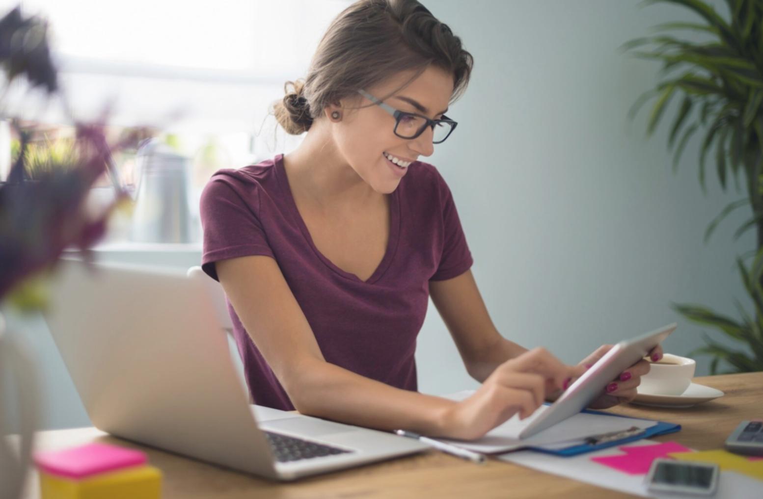 Financial education workshop with entrepreneurs reviewing business documents